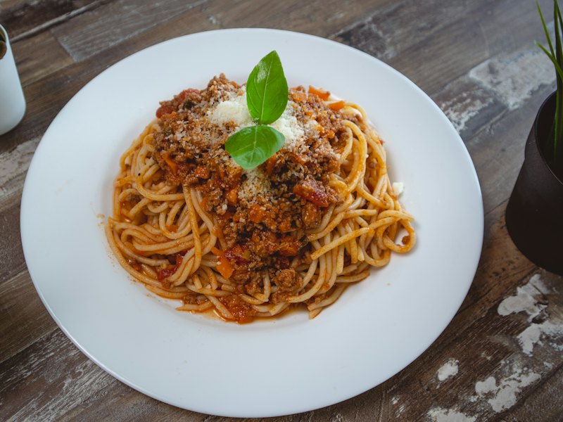 Spaghetti on white ceramic plate