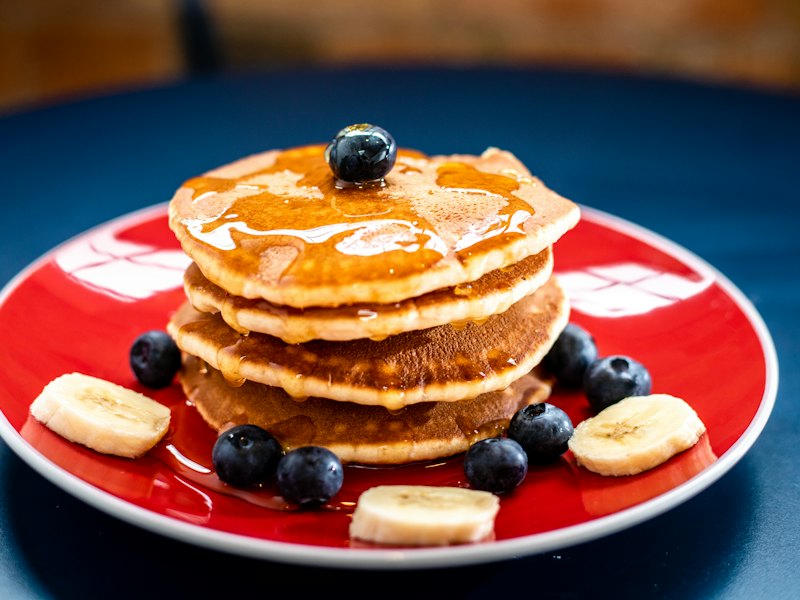 Baked pancake with blueberry and slice of banan